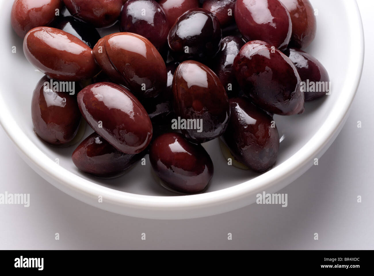 Kalamata black olives in a dish closeup Stock Photo