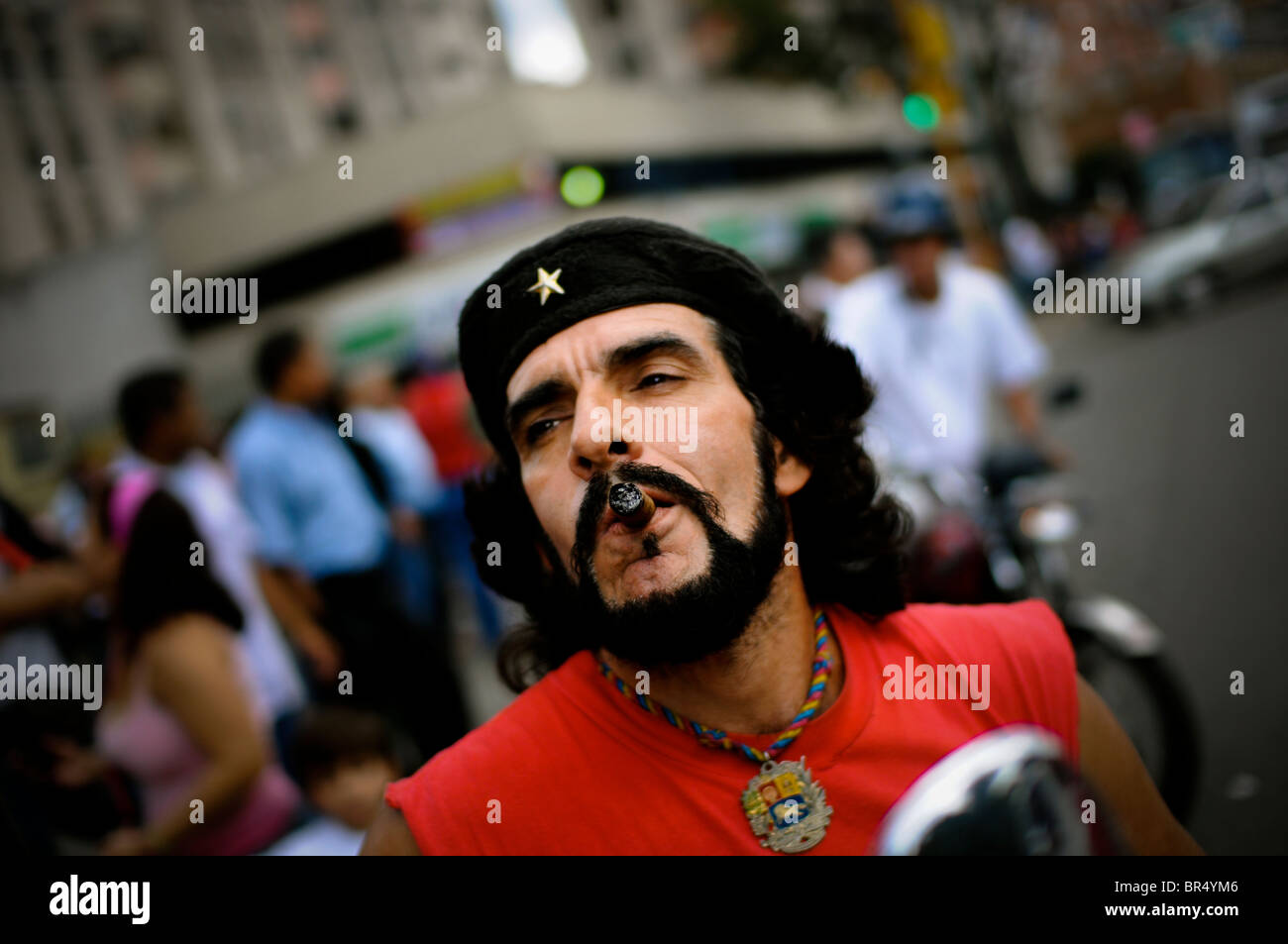 Che Guevara impersonator smokes a cigar in Venezuela. Stock Photo