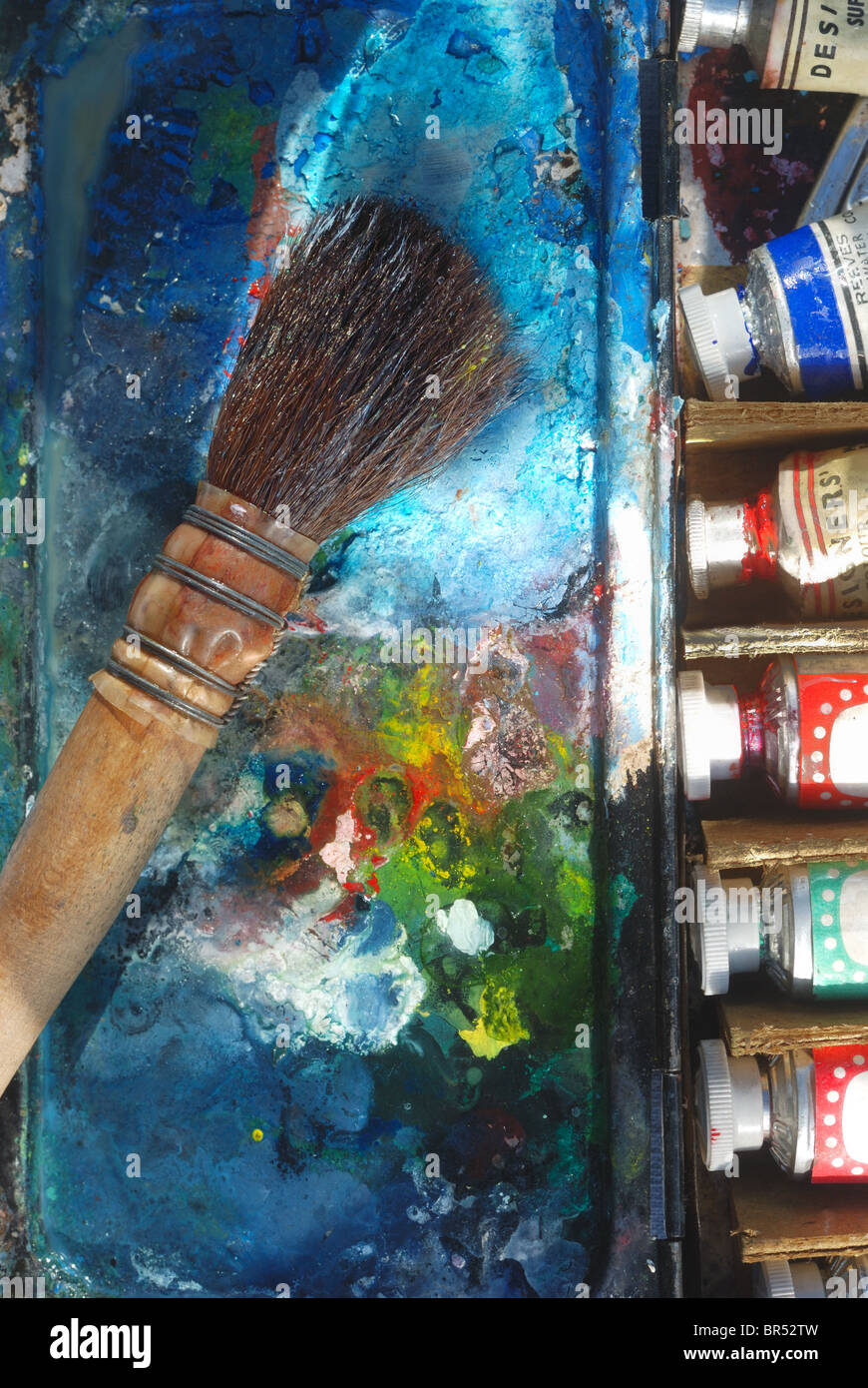 Vintage use artist's badger hair paintbrush, on an,antique artist's