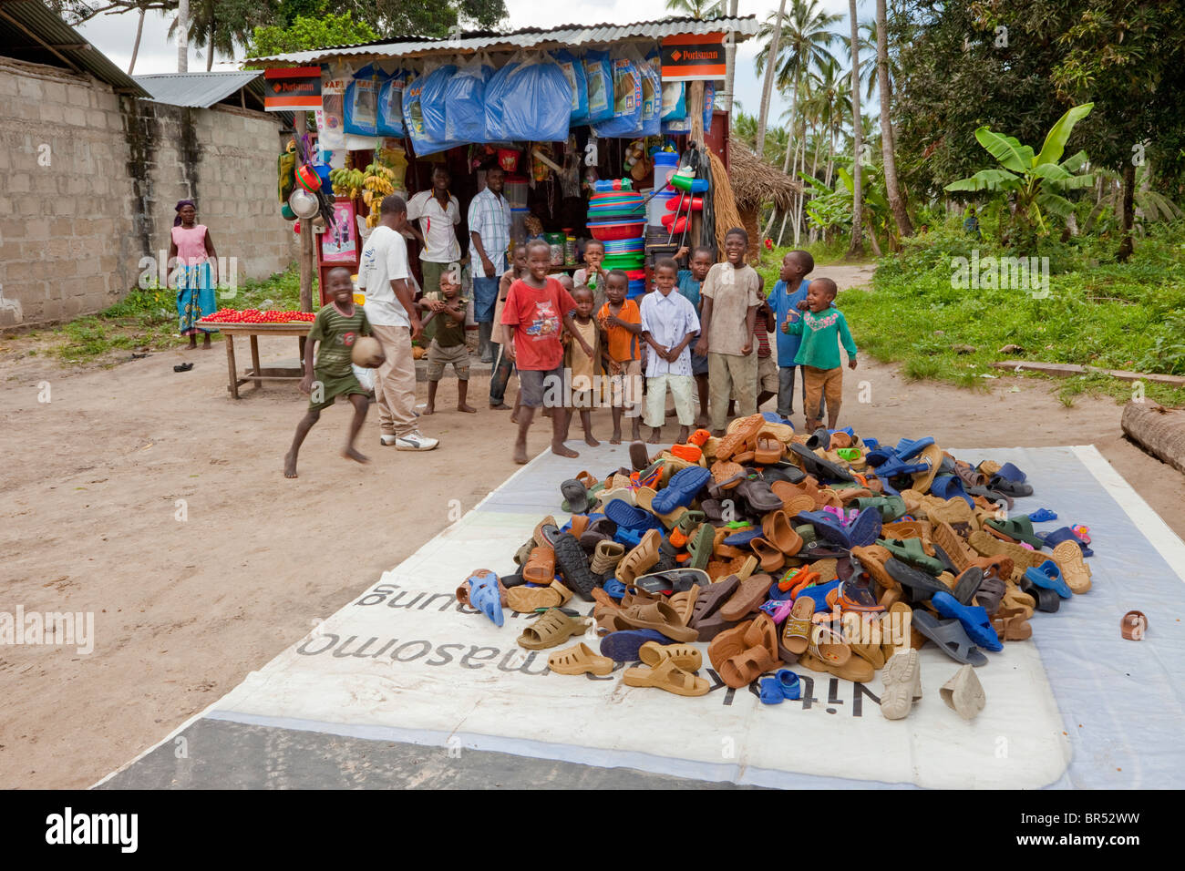 Zanzibar, Tanzania. Roadside Shop with Shoes and Sandals for Sale Stock
