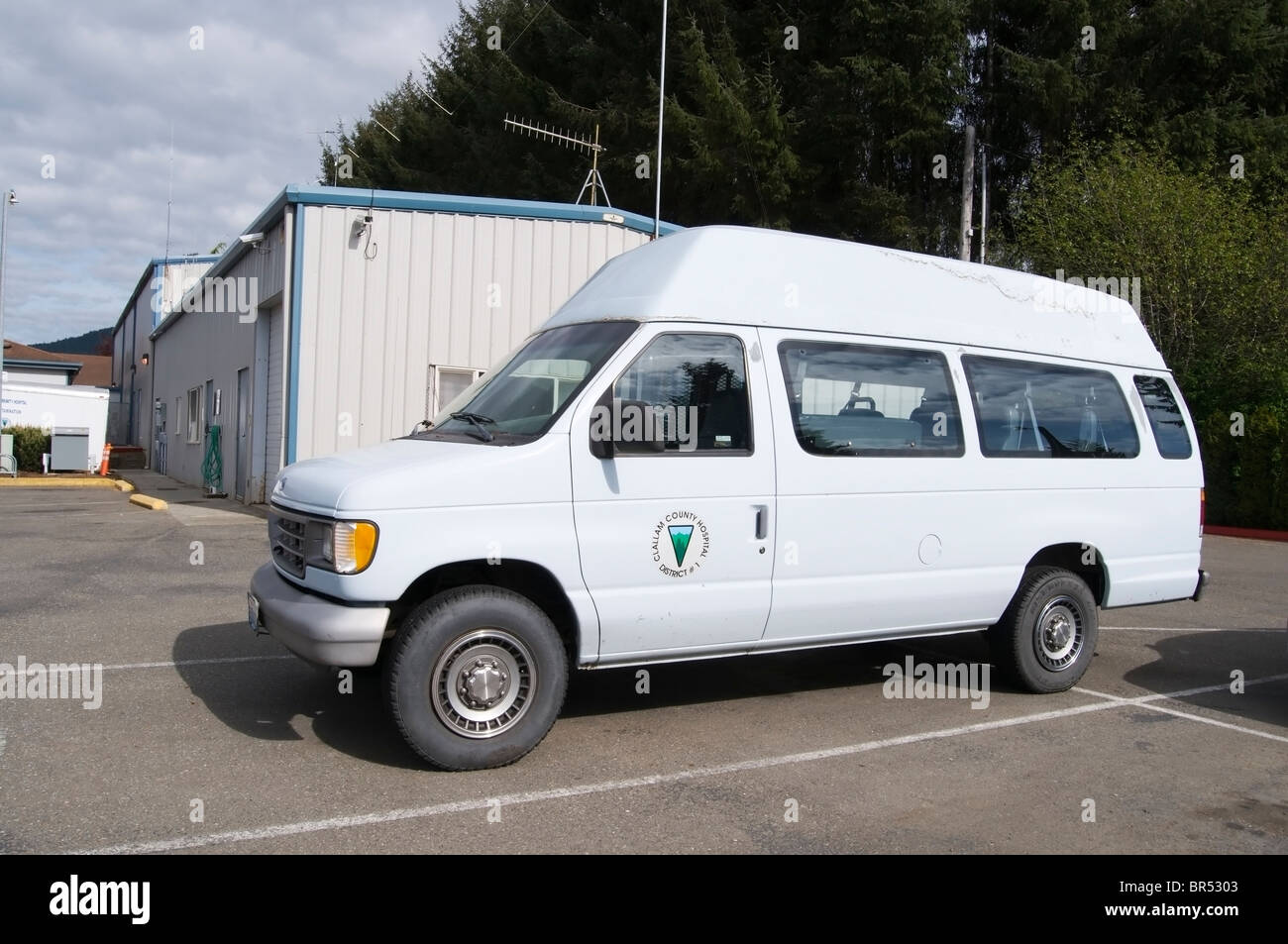 An ambulance is parked in the parking lot of Forks Community Hospital in Forks, Washington. Stock Photo