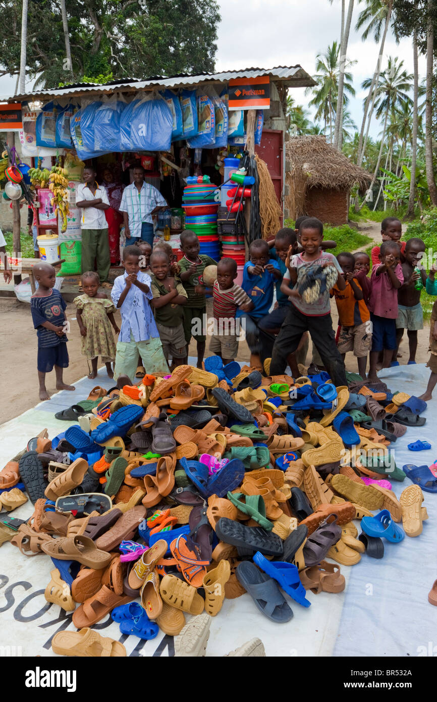 Zanzibar, Tanzania. Roadside Shop with Shoes and Sandals for Sale Stock
