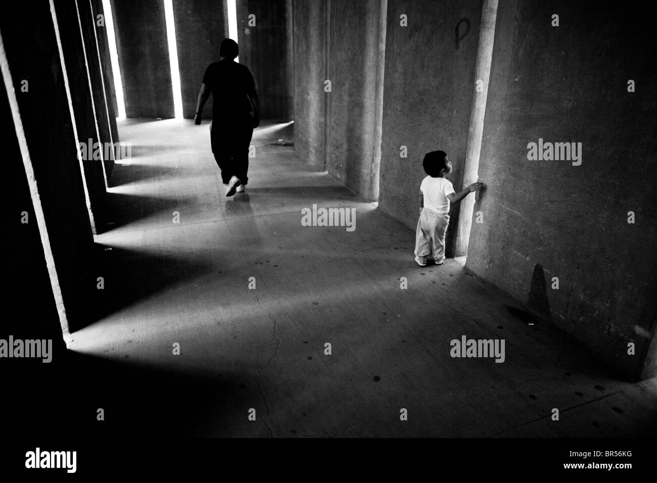 A child looks out of a women's prison in Mexico D.F. Stock Photo