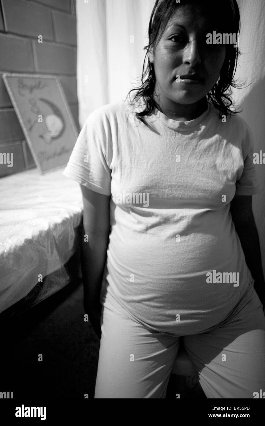 A pregnant prisoner poses in her cell inside a female penitentiary in Mexico D.F. Stock Photo