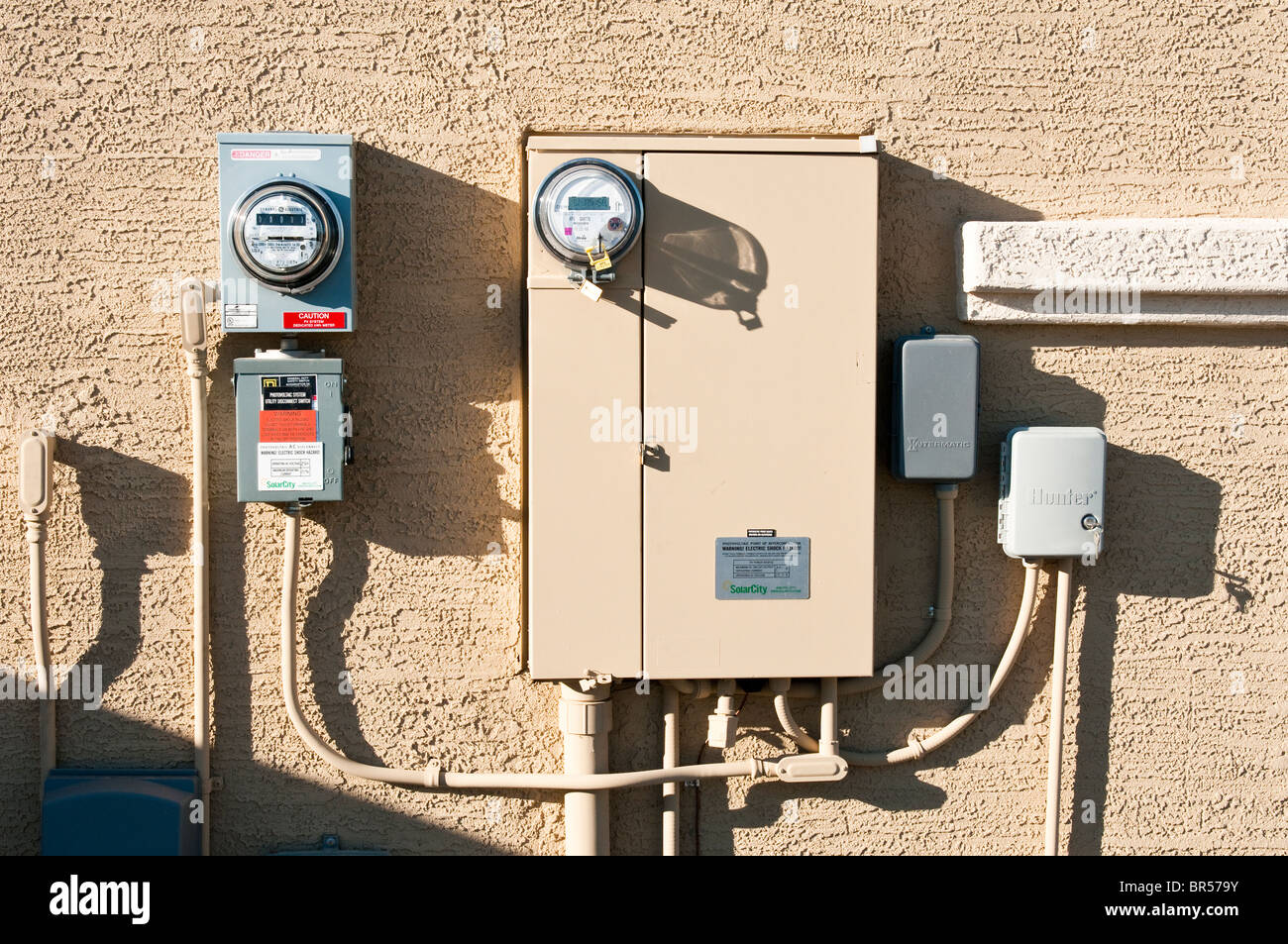 Interconnection circuitry enclosed in electrical panels connect solar