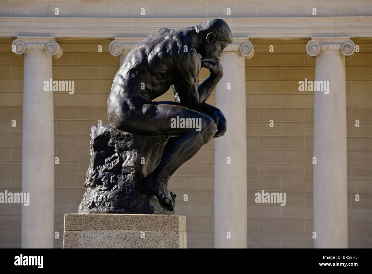 The courtyard of the LEGION OF HONOR with an Auguste Rodin sculpture titled THE THINKER - SAN FRANCISCO, CALIFORNIA Stock Photo