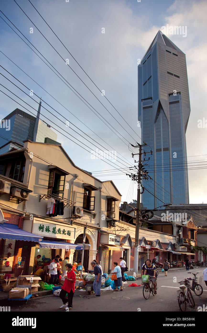 Market street and hotel tower in Shanghai China. Stock Photo