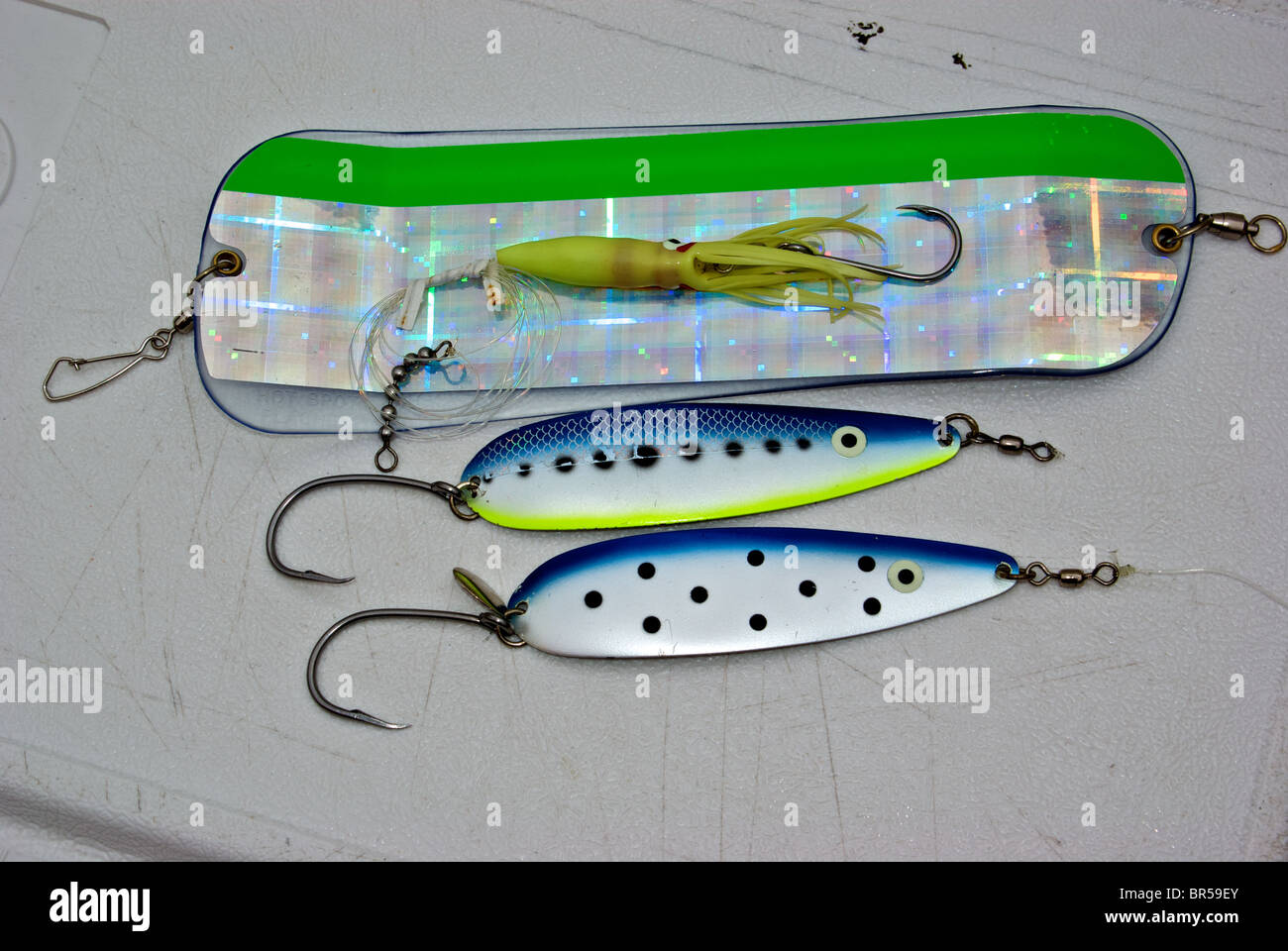 Salmon and halibut trolling lures spoon hoochie fishing lures with rotating  attractor flasher Stock Photo - Alamy