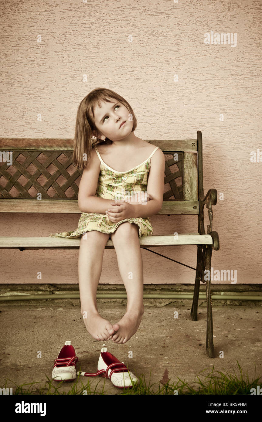 Outdoors portrait of small cute child -natural expression Stock Photo