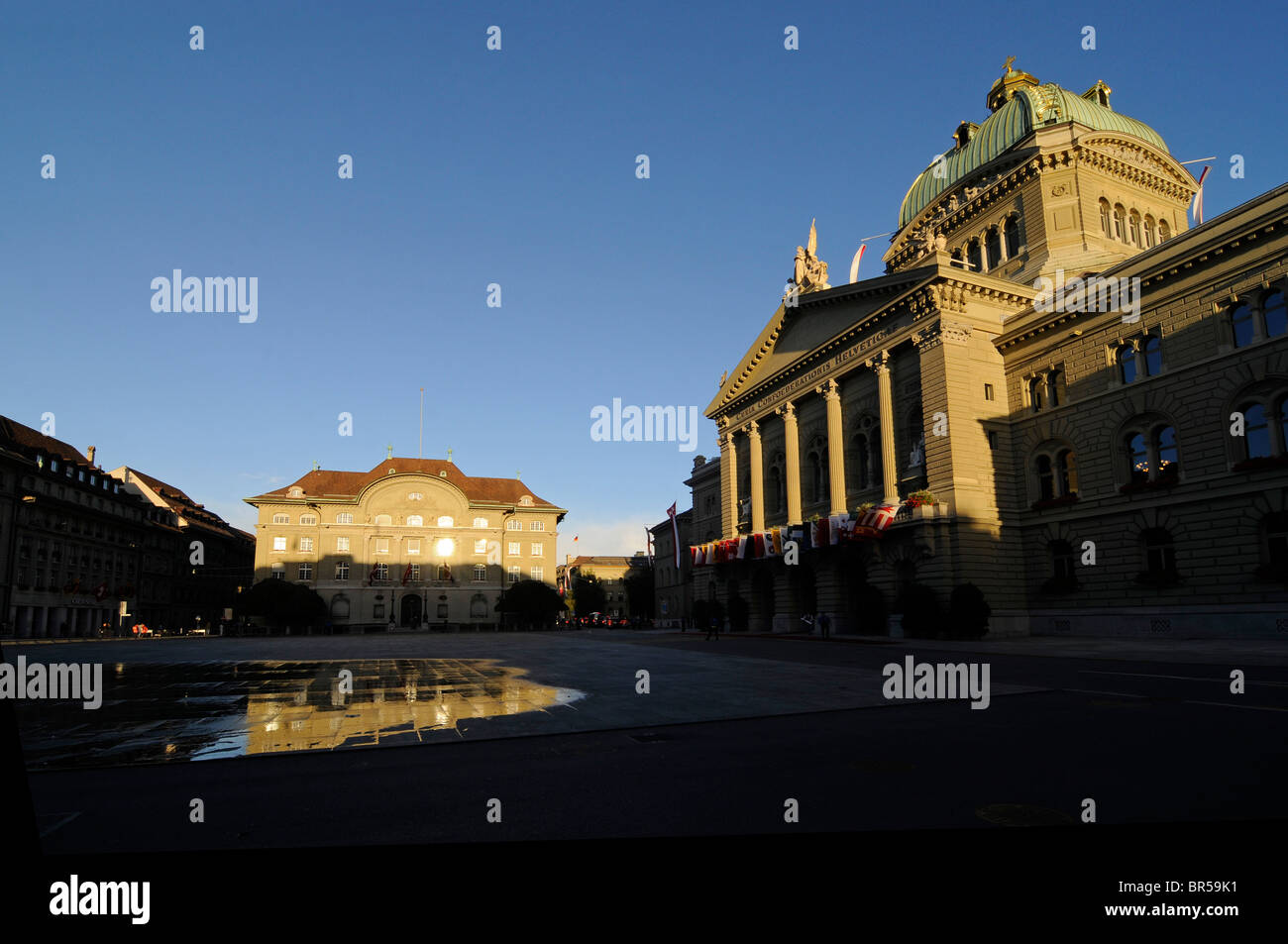Building of the Swiss national bank (L) and the Bundeshaus (parliament house) in Bern, Switzerland. Stock Photo