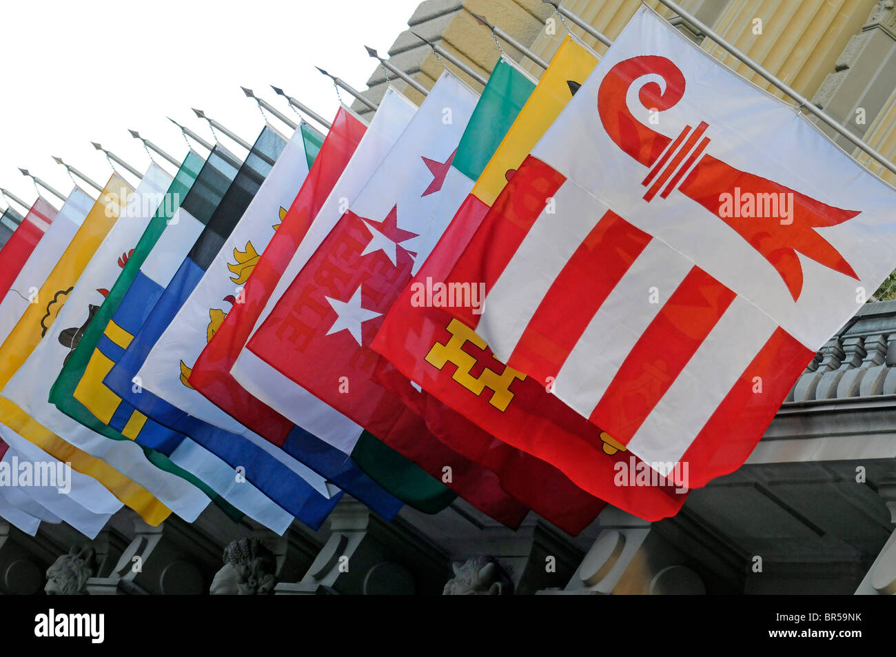 Flags of all the 26 Swiss cantons on display on the Federal Parliament 'Bundeshaus' in Bern, Switzerland. Stock Photo