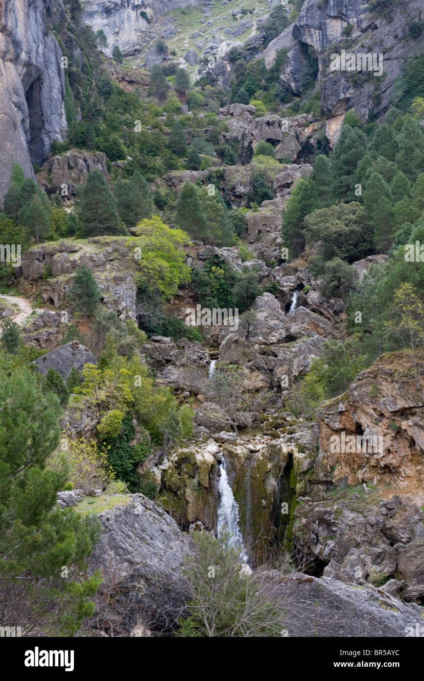 Beautiful scenery of a waterfall on a rocky mountainside, Cazorla National Park, Jaen Province, Andalucia, Spain Stock Photo