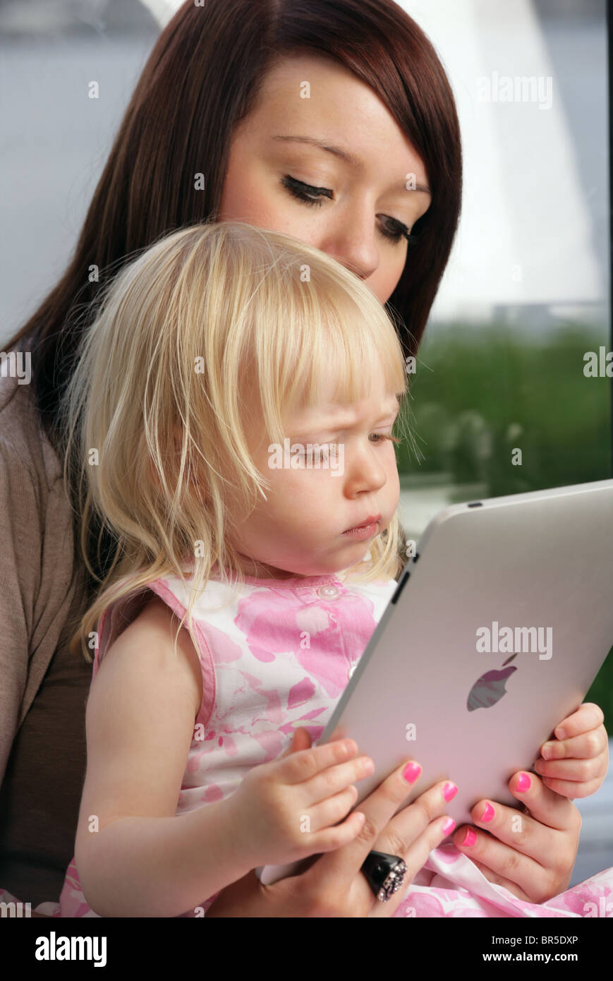 Family using computer uk hi-res stock photography and images - Alamy