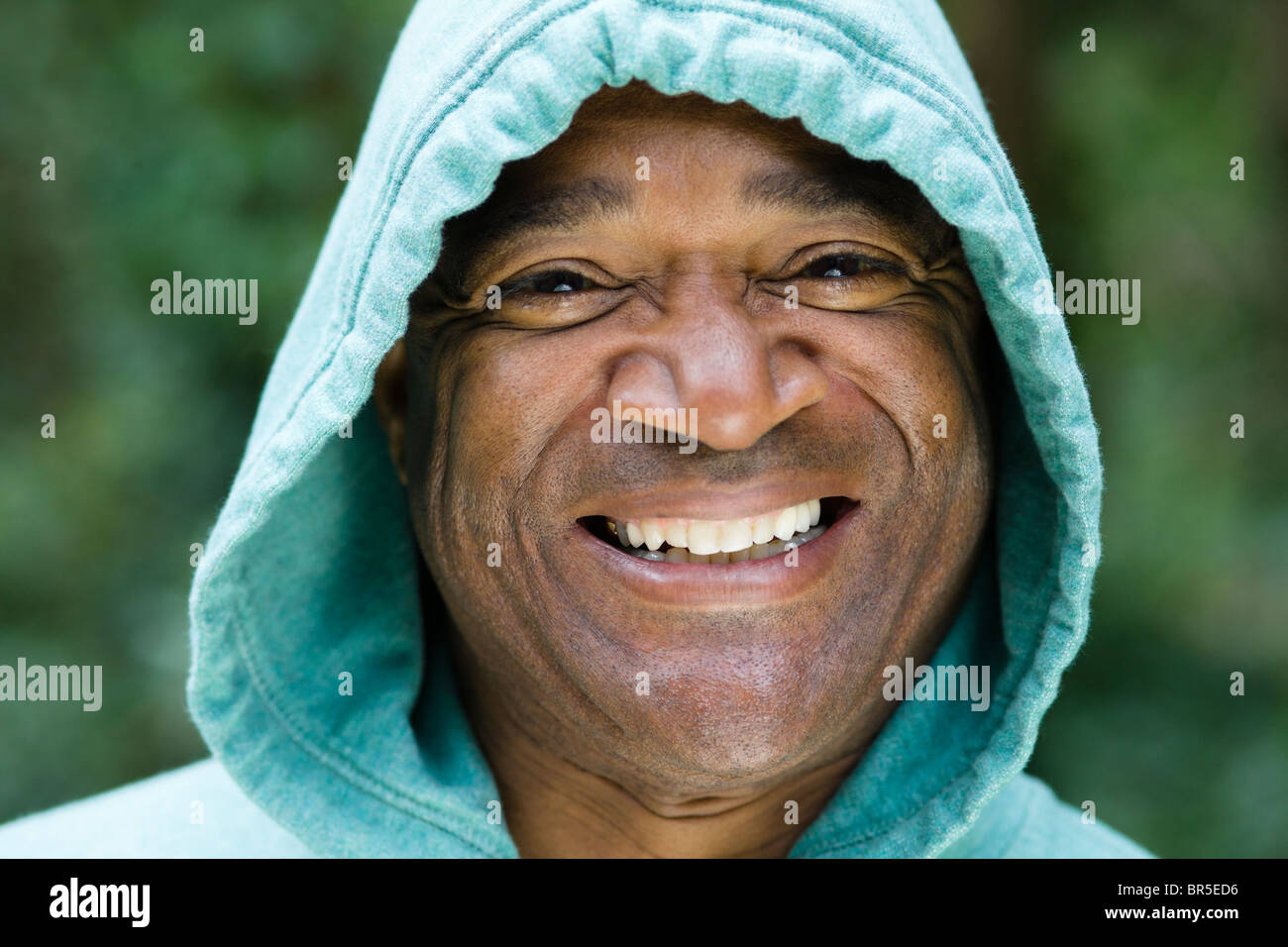 Smiling African American man in hoody Stock Photo - Alamy