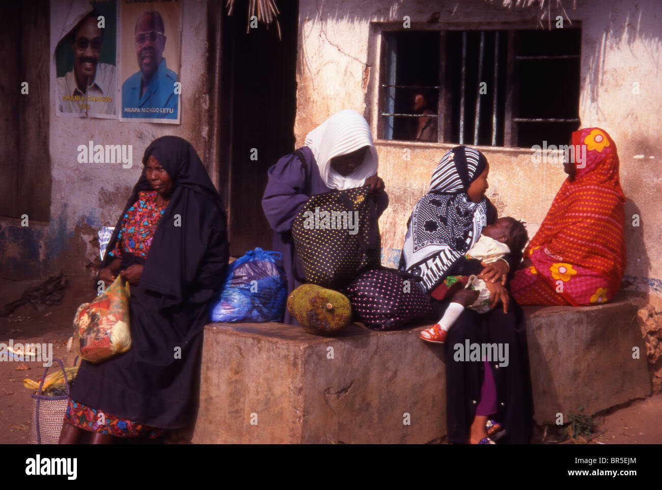 Villagers waiting for the bus. Zanzibar. Tanzania. Stock Photo