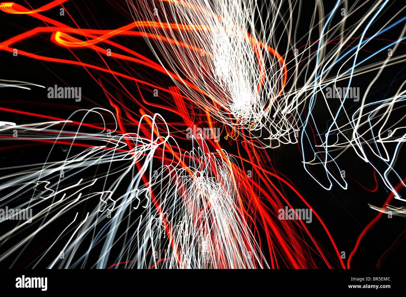 motorway,night,traffic,trail,lights,cars,fast,moving,blur,speed,flow,bright,movement,abstract,design,lines,zoom,electric,lights, Stock Photo