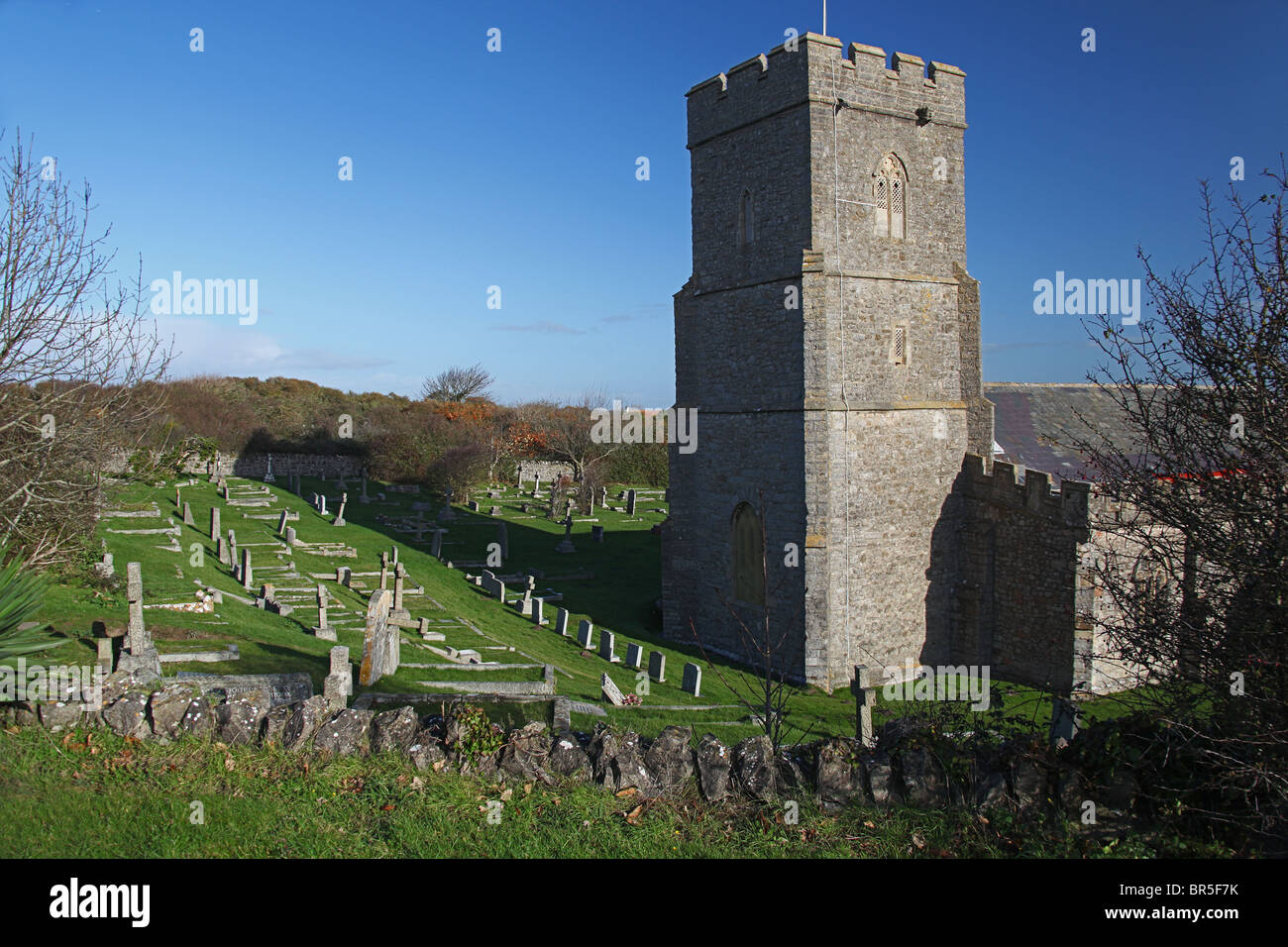 St Mary's church at Berrow in Somerset nestles amongst the extensive sand dunes on the Bristol Channel coast. Stock Photo