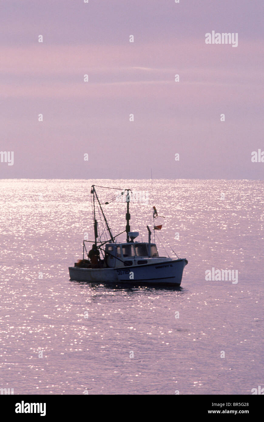 lobstering lobster boat lobster Maine coast coastline USA industry boat Stock Photo