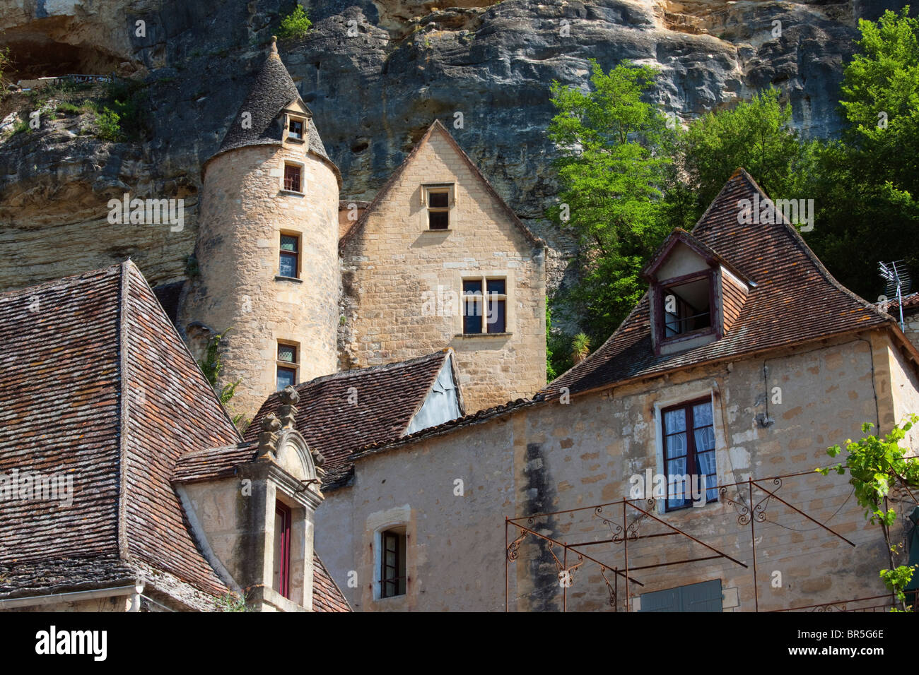 Buildings against cliff, La Roque-Gageac; Dordogne; France Stock Photo