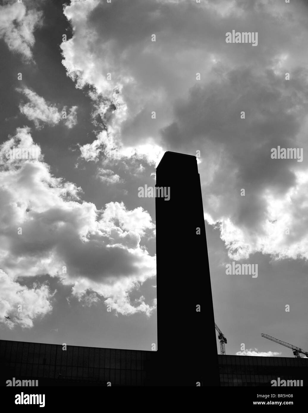 Tate Modern Silhouette against dark clouds Stock Photo