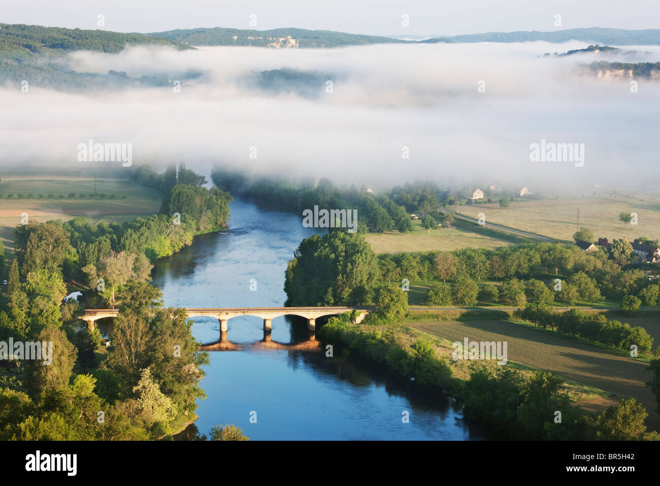 Morning mist over the river Dordogne; France Stock Photo