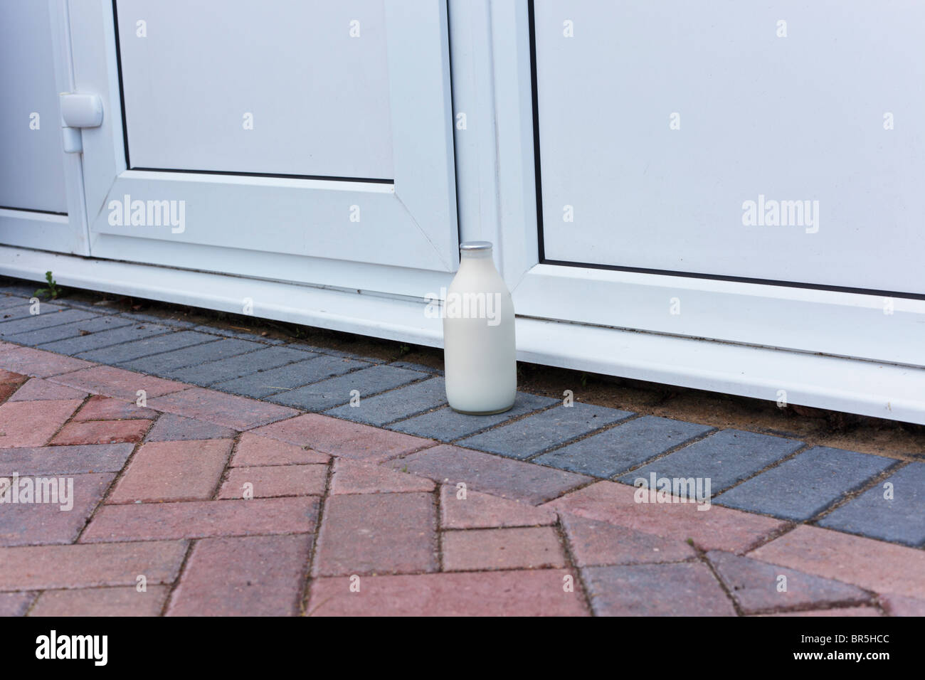 Pint of milk on the doorstep, UK Stock Photo