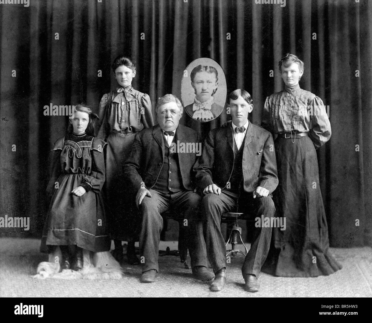 Historic photograph, family, the deceased represented by a photo, around 1922 Stock Photo