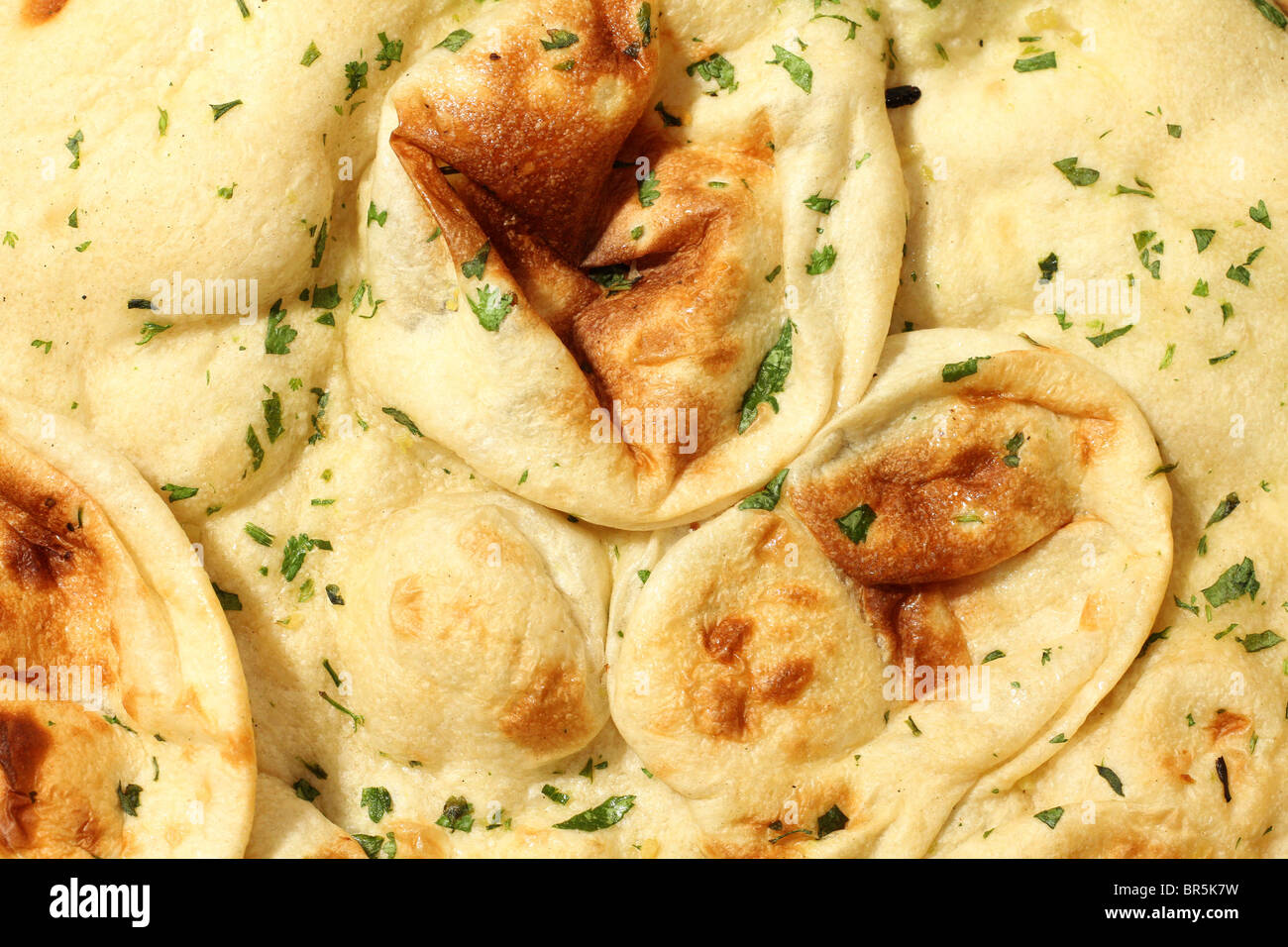Home made Naan Bread Traditionally Indian Cuisine Stock Photo