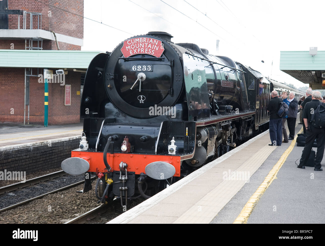 The 'Princess Coronation' class steam locomotive 'Duchess of Sutherland' hauling the 'Cumbrian Mountain Express'. Stock Photo