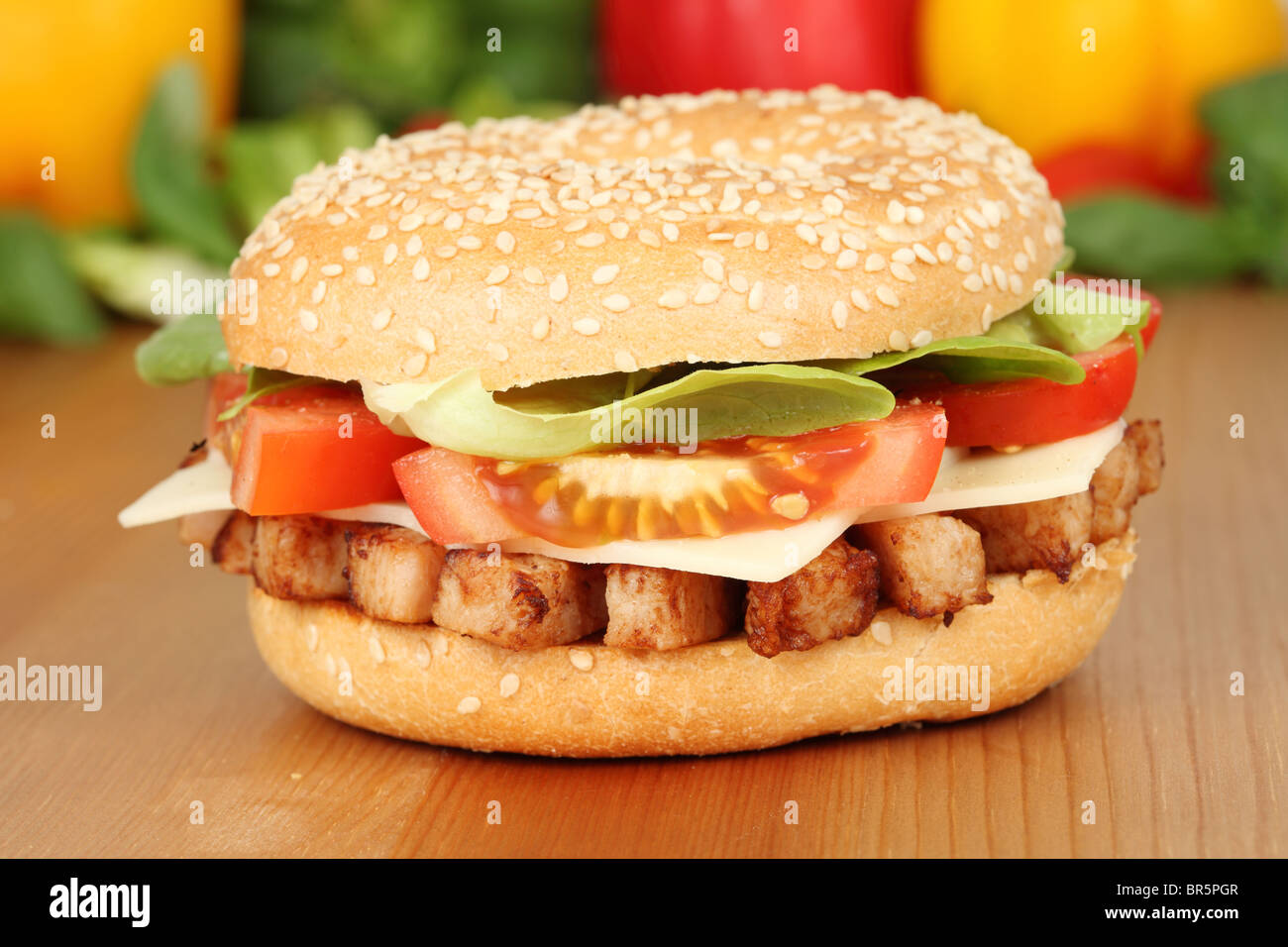 Closeup of a bagel with grilled chicken meat Stock Photo Alamy