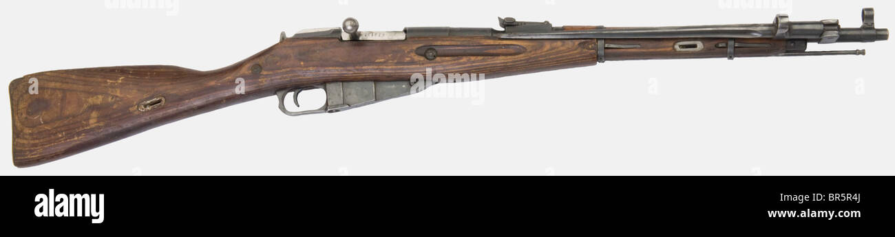 A Soviet Mosin-Nagant carbine pattern 44, calibre 7,62 x 54R, number 1181 made in 1944 by Ijevsk factory. Laminated stock, no sling, but with is cleaning rod and foldable bayonet. Original bluing. historic, historical, 1930s, 20th century, gun, guns, firearm, fire arm, firearms, fire arms, weapons, arms, weapon, arm, fighting device, object, objects, stills, clipping, clippings, cut out, cut-out, cut-outs, military, militaria, piece of equipment, Stock Photo