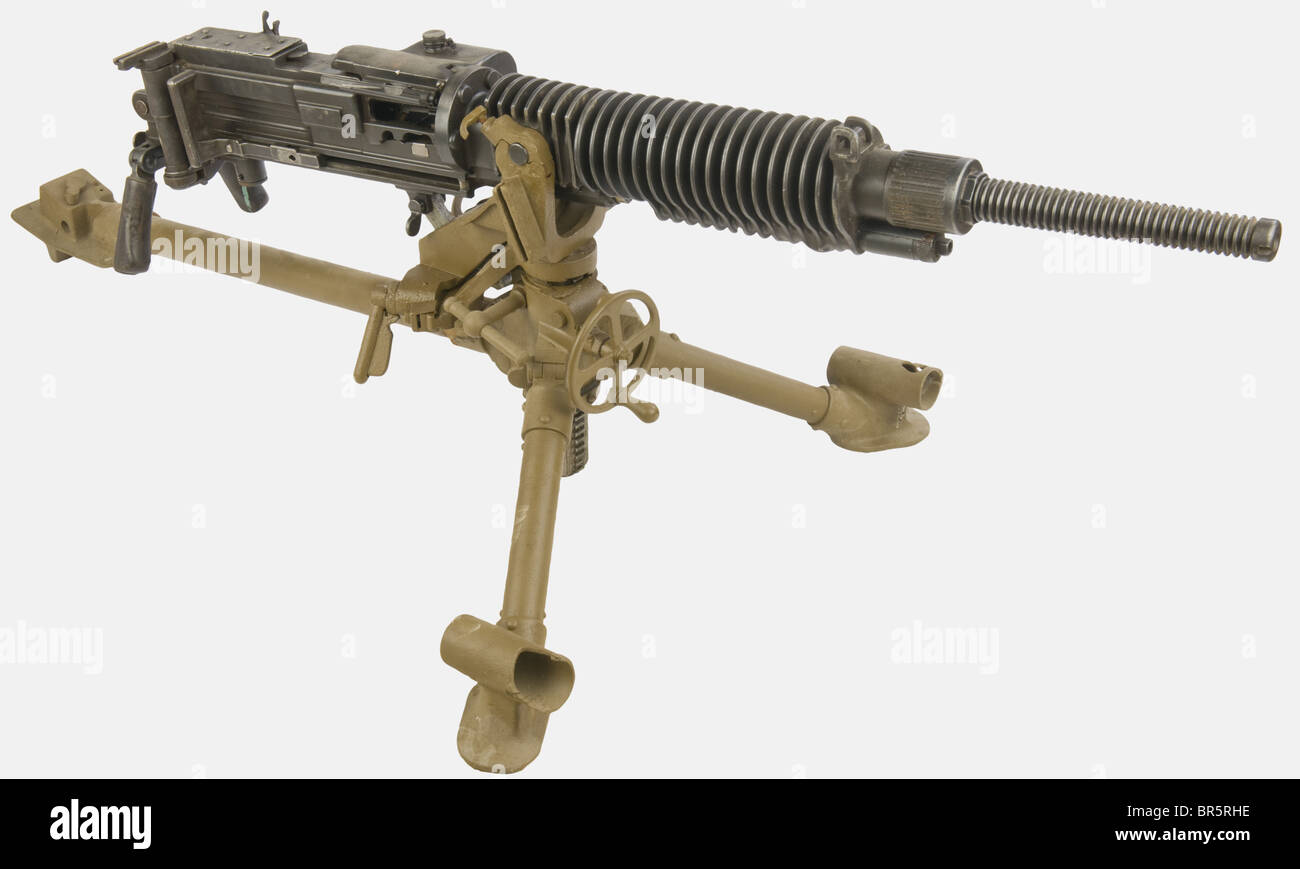 A Japanese heavy machine gun, calibre 7,7mm Japanese type 'Taisho 92', serial number 18848, original bluing. With a brown painted tripod with serial number 30570. historic, historical, 20th century, gun, guns, firearm, fire arm, firearms, fire arms, weapons, arms, weapon, arm, fighting device, object, objects, stills, clipping, clippings, cut out, cut-out, cut-outs, military, militaria, piece of equipment, Stock Photo