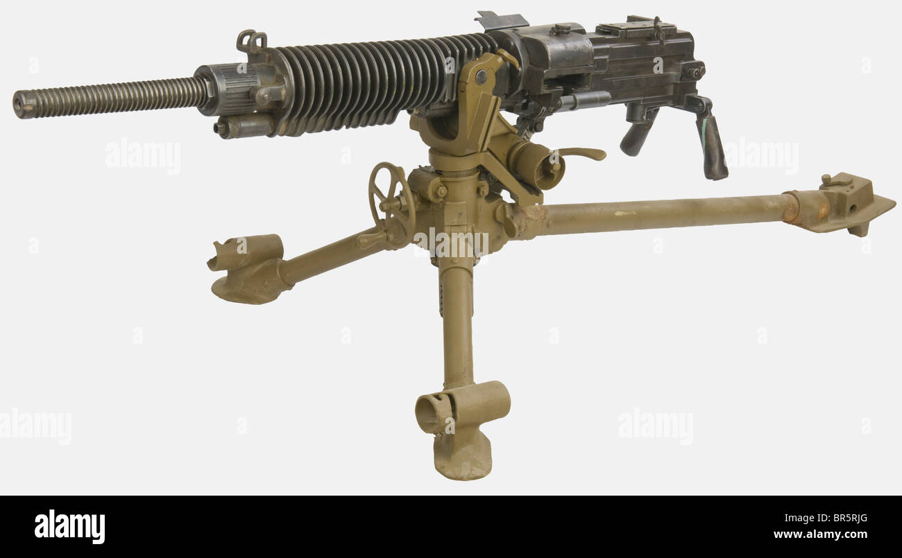 A Japanese heavy machine gun, calibre 7,7mm Japanese type 'Taisho 92', serial number 18848, original bluing. With a brown painted tripod with serial number 30570. historic, historical, 20th century, gun, guns, firearm, fire arm, firearms, fire arms, weapons, arms, weapon, arm, fighting device, object, objects, stills, clipping, clippings, cut out, cut-out, cut-outs, military, militaria, piece of equipment, Stock Photo