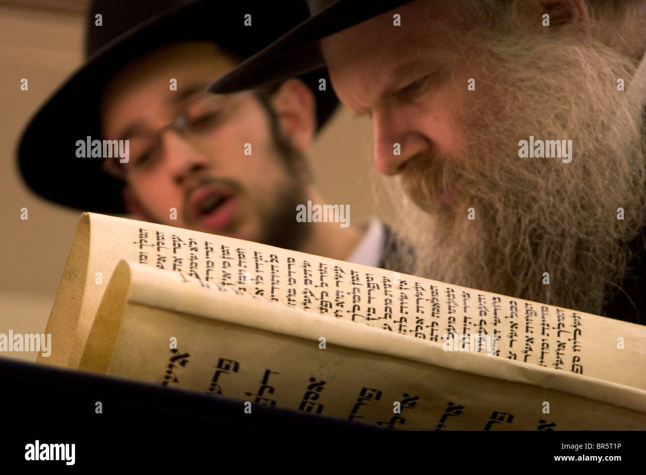 Rabbi Herschel Gluck of Walford road Synagogue reads the Megillah "The