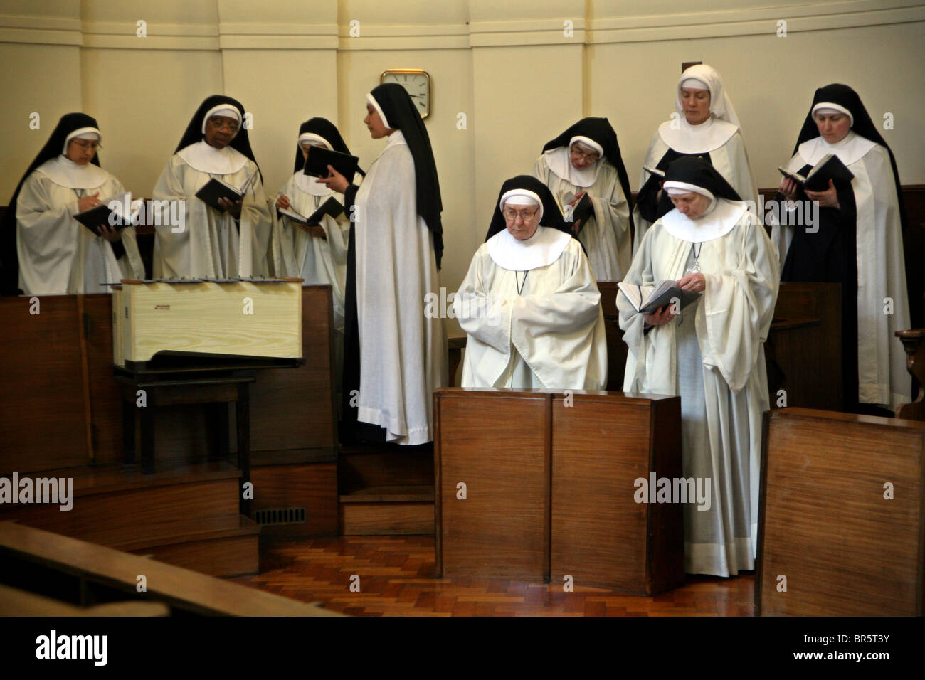 Sisters sing prayers every afternoon at the Tyburn Convent on Bayswater Rd, London. Stock Photo
