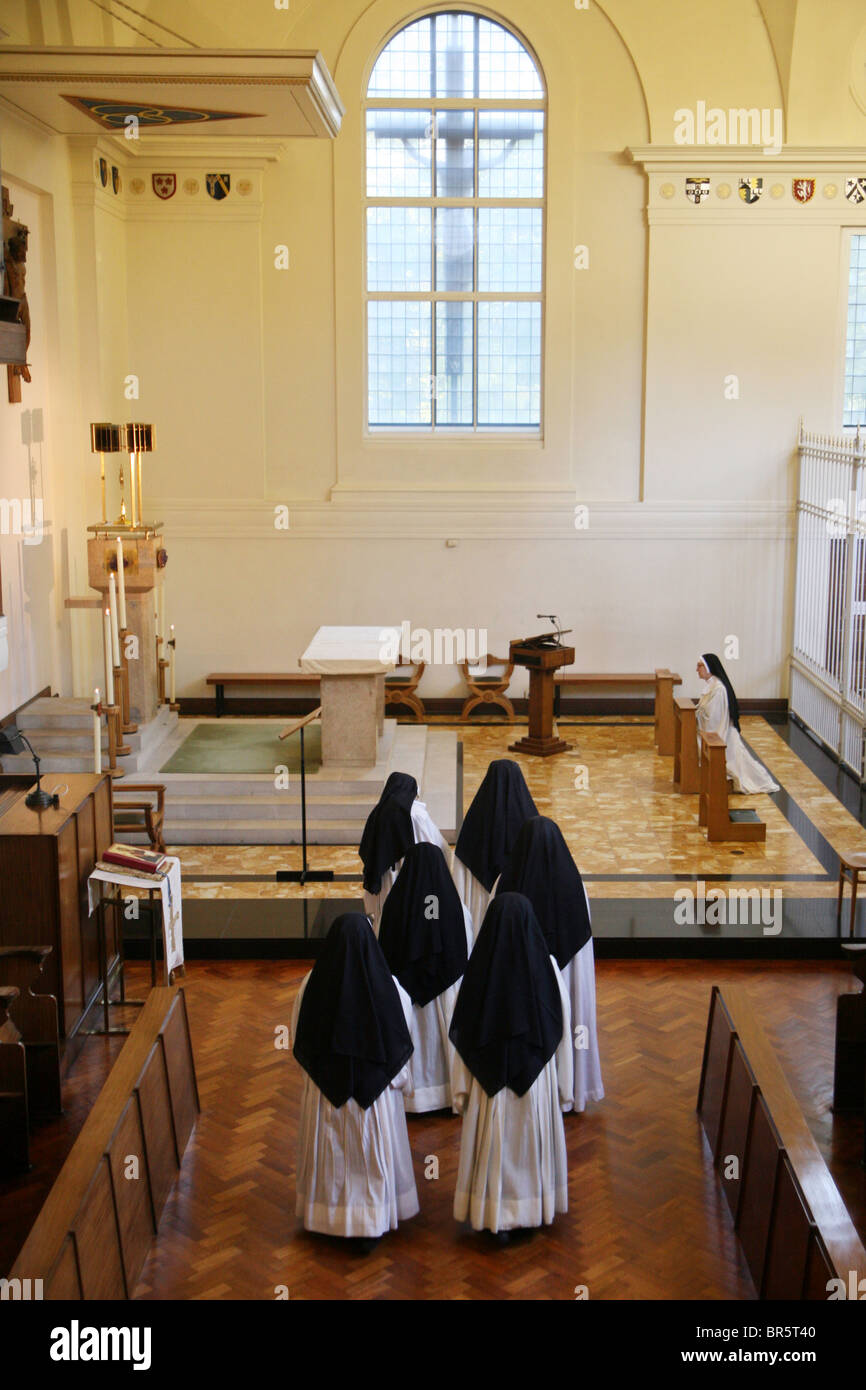Sisters go to pray at the crypt in the Tyburn Convent on Bayswater Rd, London. Stock Photo