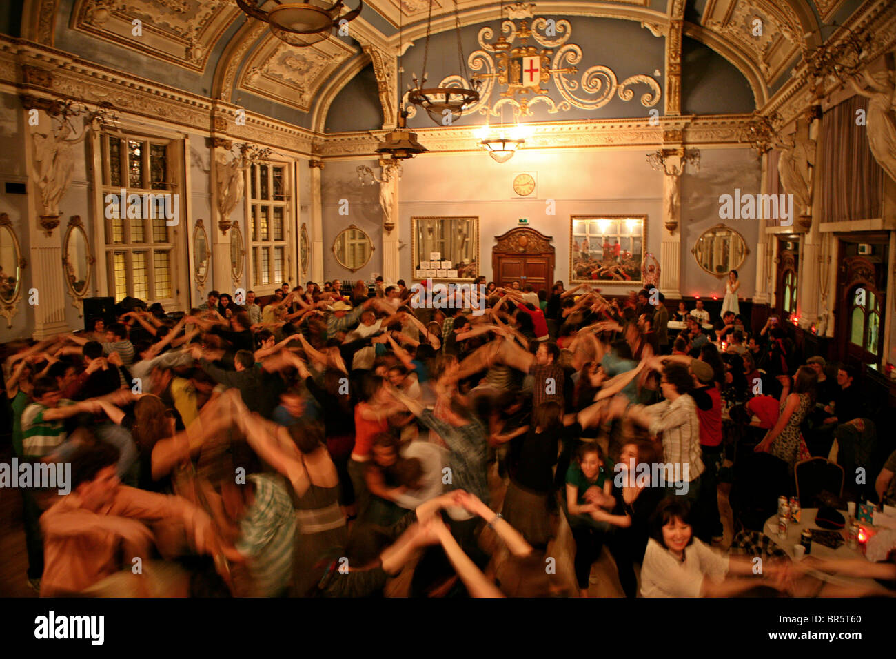 A Cut A Shine Ceilidh dance held in the Great Hall of the Old Finsbury Town Hall. London. Stock Photo