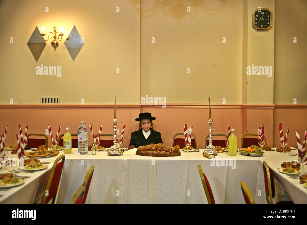 A 13 Year old Orthodox Jewish Boy Sits Waiting For His Bar Mitzvah To a-13-year-old-orthodox-jewish-boy-sits-waiting-for-his-bar-mitzvah-to