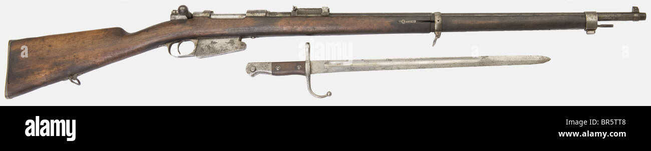A Turkish Mauser M 1890, calibre 7,65 Belgian Mauser, serial number 40898 (in Turkish writing), dated on the receiver 1309 (1891). Some parts missing, pitted on the bolt, the stock repaired with wood paste, some worm holes, corroded handle. With a bayonet dated 1312 (1894). historic, historical, 19th century, gun, guns, firearm, fire arm, firearms, fire arms, weapons, arms, weapon, arm, fighting device, object, objects, stills, clipping, clippings, cut out, cut-out, cut-outs, military, militaria, piece of equipment, Stock Photo
