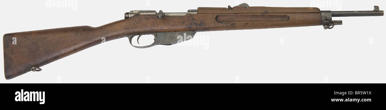 A Dutch short rifle M 1893, calibre 6,5 x 53, serial number 5994, made in  1917, stamped on the side of the receiver "HEMBRUG 1917", stock stamped  1918, no sling. Strange wood