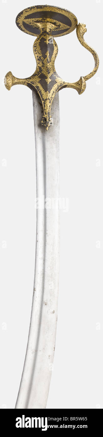 A gold-inlaid Indian tulwar, 19th century A single-edged blade with ...