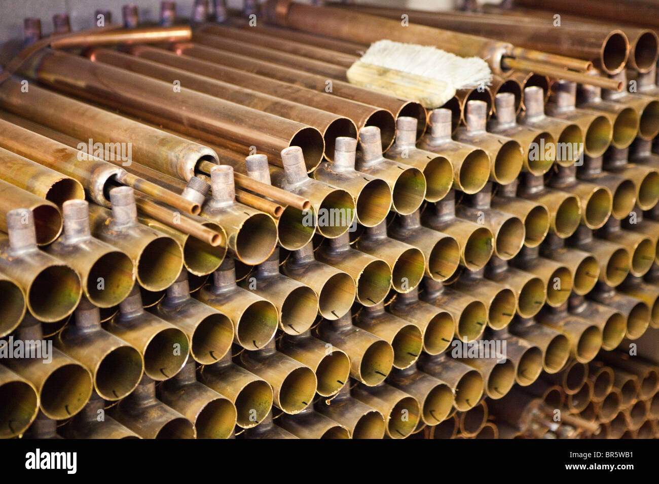 A stack of half completed Willis Renewables Solar Syphons at the Copper Industries factory in Northern Ireland. Stock Photo