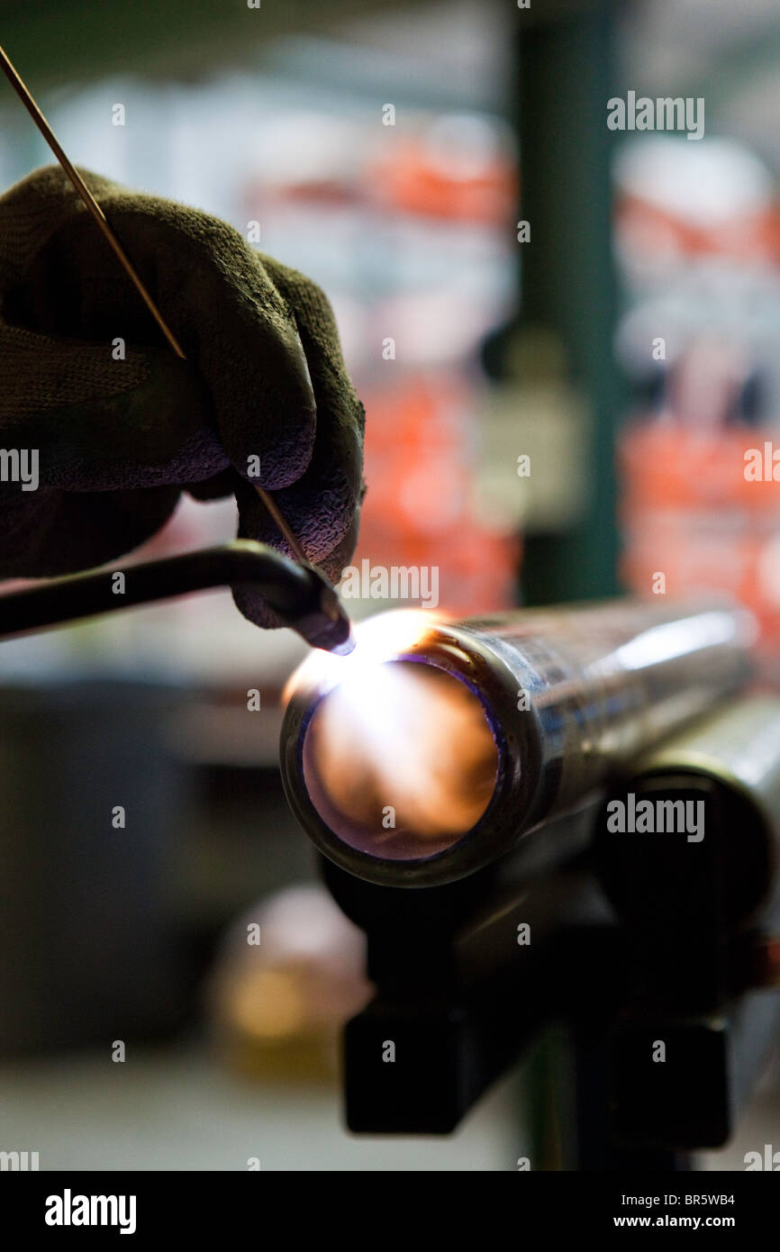 Soldering a part of the Willis Renewables Solar Syphon at the Copper
