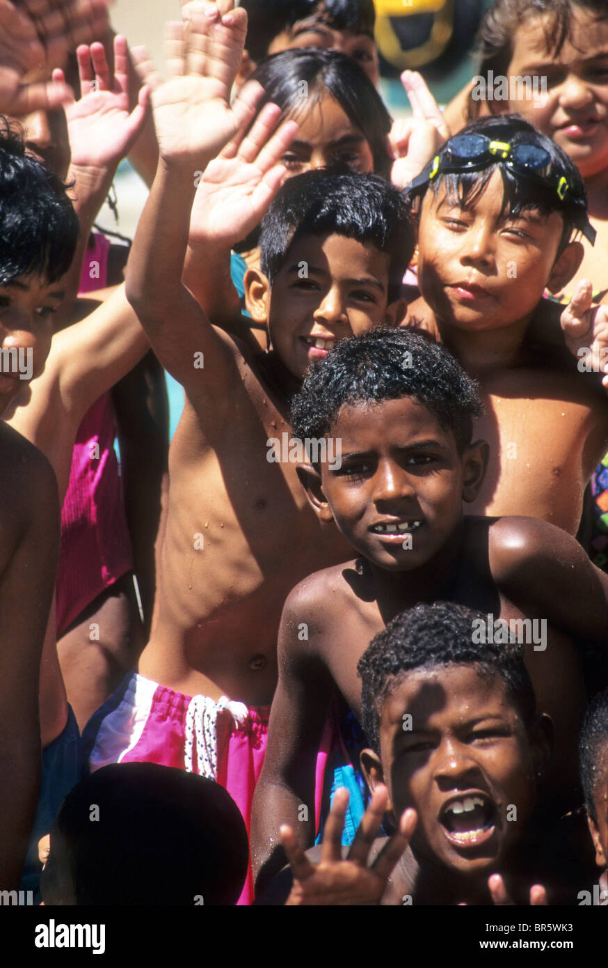boy girl swim mixed race Hispanic black friend fun recreation pool Boys