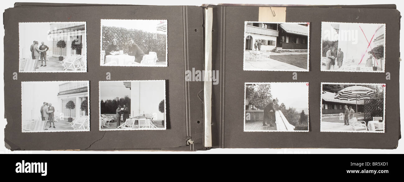 Adolf Hitler, a private photo album "Berghof" 107 photos, taken by a confidant in close proximity to Hitler on the Obersalzberg in the summer of 1935/36, starting with landscape pictures of the Berghof or shots taken from the building's point of view. Then follow pictures of Angela Raubal (Hitler's half-sister), marching SS Bodyguard Regiment (Leibstandarte), Hitler going on walks with Albert Speer, Rudolf Heß, Hermann Esser, Heinrich Hoffmann, and Karl Brandt. Also photos taken from the Berghof's patios showing Hitler in the company of Eva Braun, Martin Borman, Stock Photo