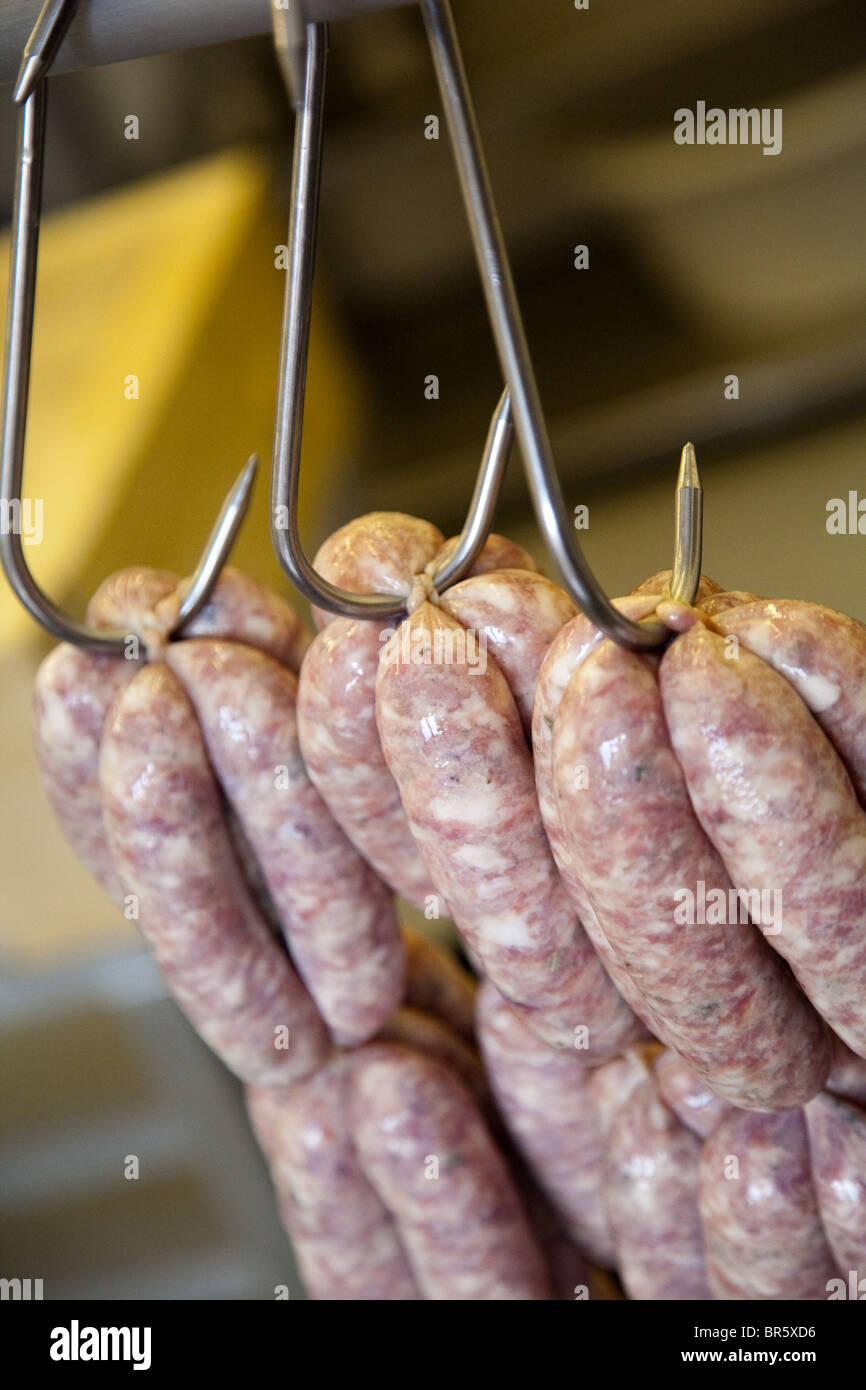 Pork sausages being made by hand Stock Photo Alamy