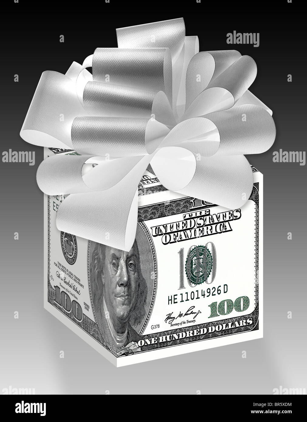 Money gift box wrapped up with $100 notes and a bow on top. Stock Photo