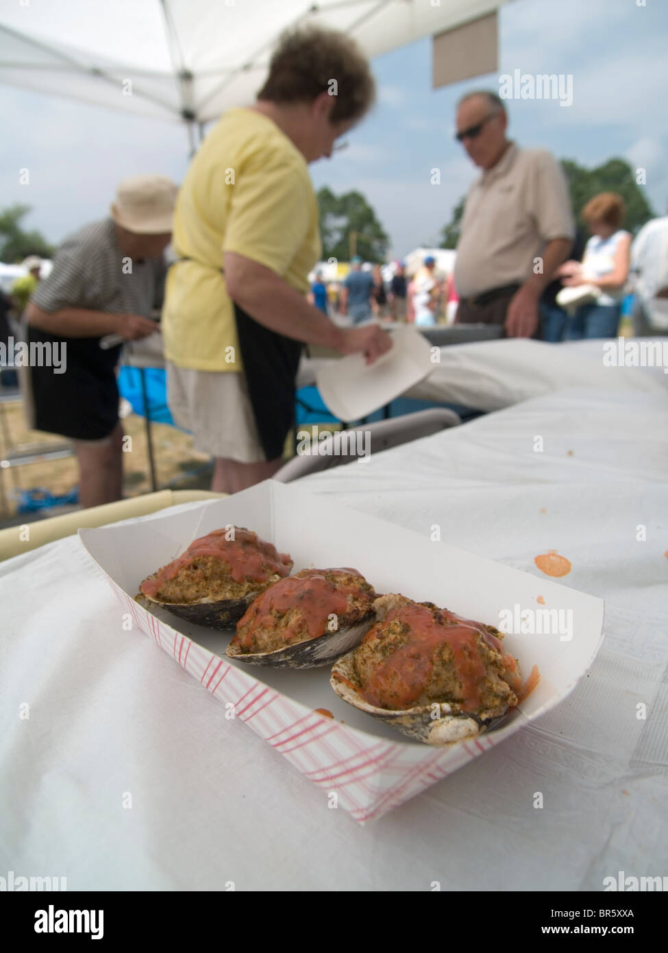 Vendors sell premade stuffed Quahogs as part of the Warren Quahog