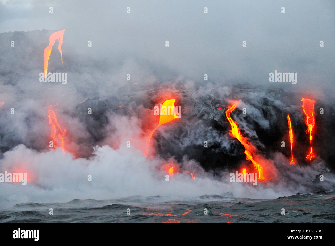 Steam rising off lava flowing into ocean, Kilauea Volcano, Hawaii