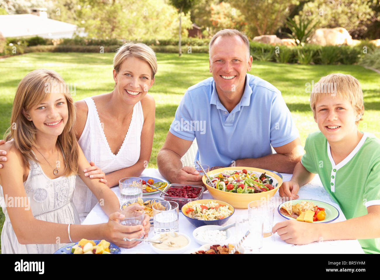 Teen girl sitting picnic table hi-res stock photography and images - Alamy